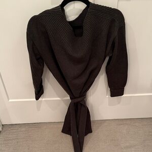 Intermix belted sweater or dress. Wear w/leggings or tights and high boots.